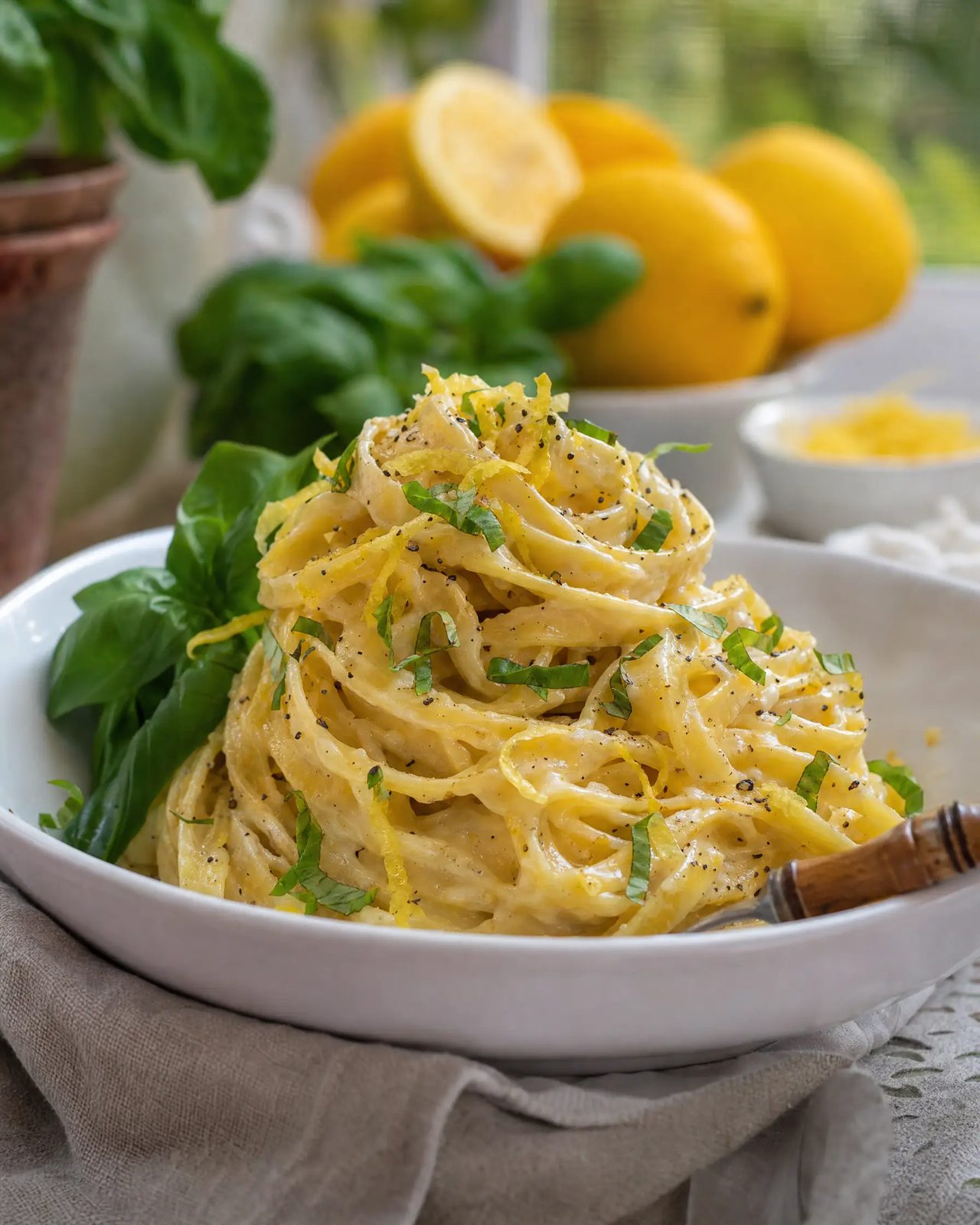 Twirl of creamy lemon fettuccine with herbs